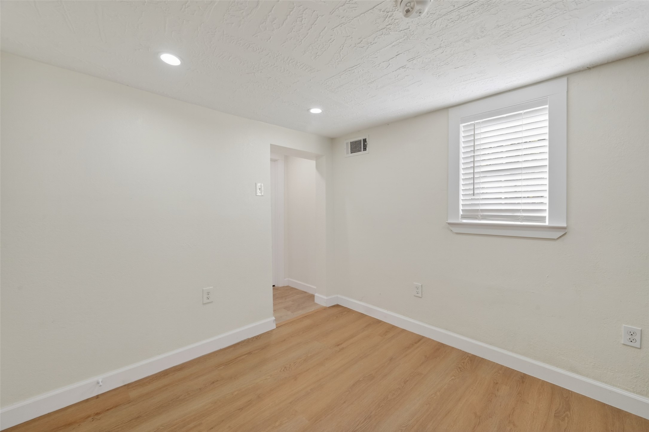 2118 Webster Street, Unit 3 Houston, TX 77003 - Photo 13 of 24 wooden floor in a room