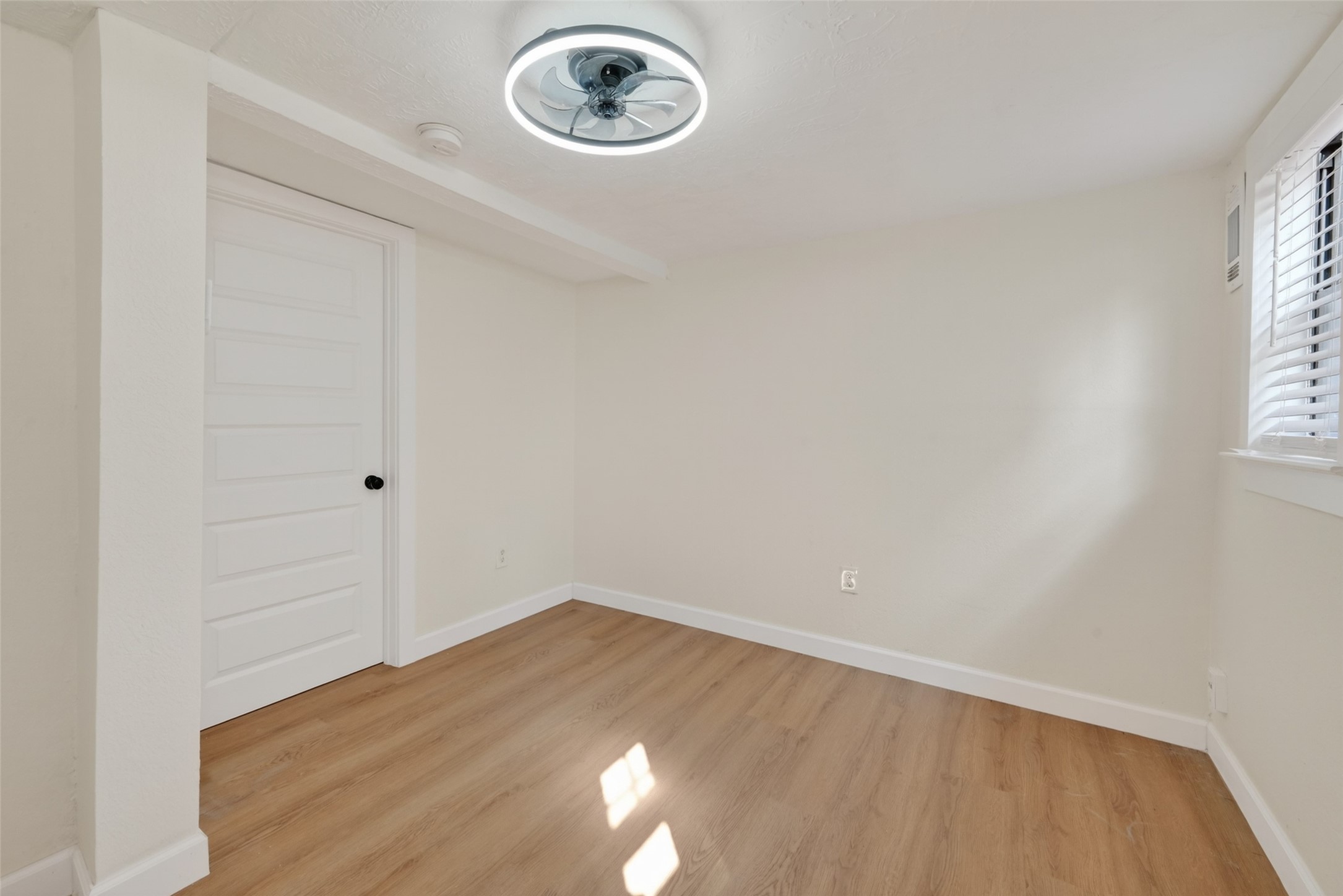 2118 Webster Street, Unit 3 Houston, TX 77003 - Photo 17 of 24 a view of a room with wooden floor