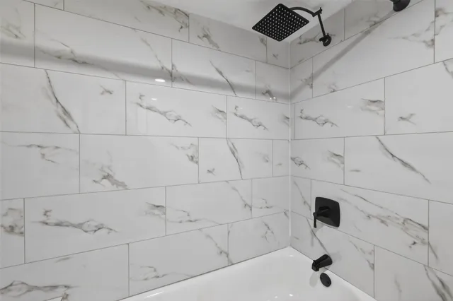 a bathroom with a bathtub