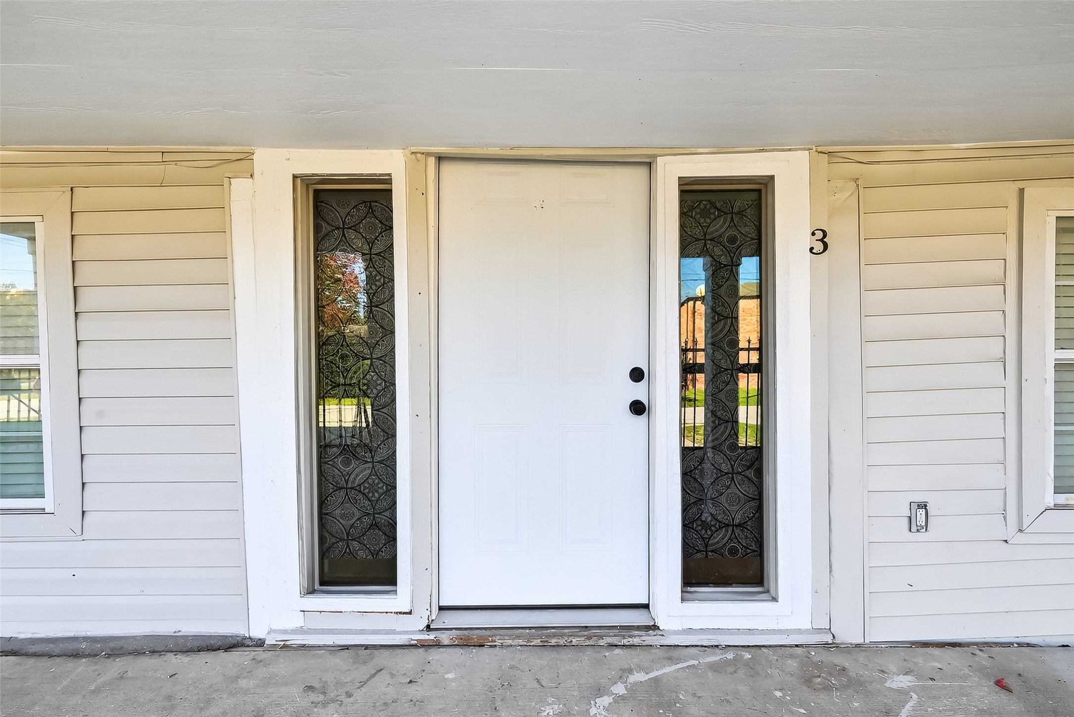 2118 Webster Street, Unit 3 Houston, TX 77003 - Photo 2 of 24 front view of a house with a door and a window