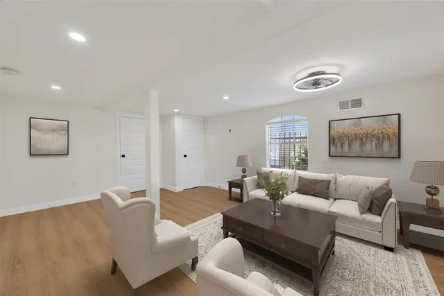 a living room with furniture and a couch