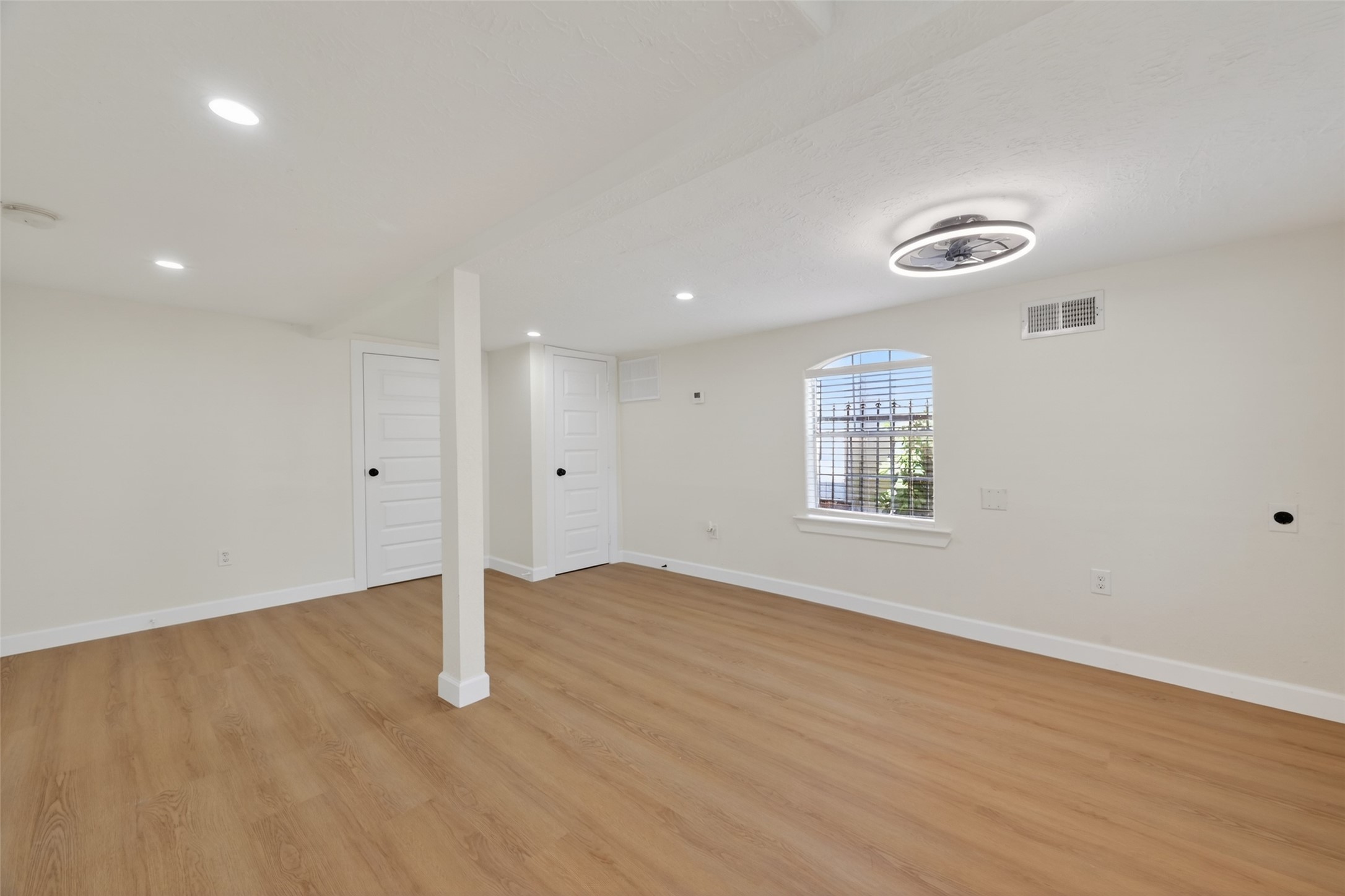 2118 Webster Street, Unit 3 Houston, TX 77003 - Photo 4 of 24 a view of an empty room with a window