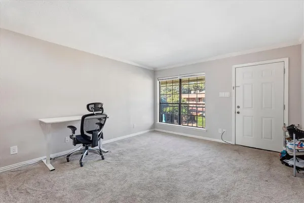 a workspace with furniture and a fireplace