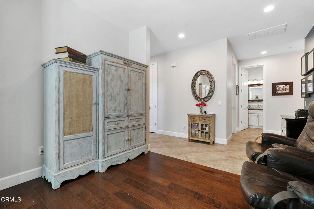 1424 Donegal Way Oxnard, CA 93035 - Photo 20 of 64 a living room with furniture wooden floor and a fireplace