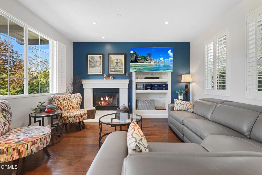 1424 Donegal Way Oxnard, CA 93035 - Photo 4 of 64 a living room with furniture and a fireplace
