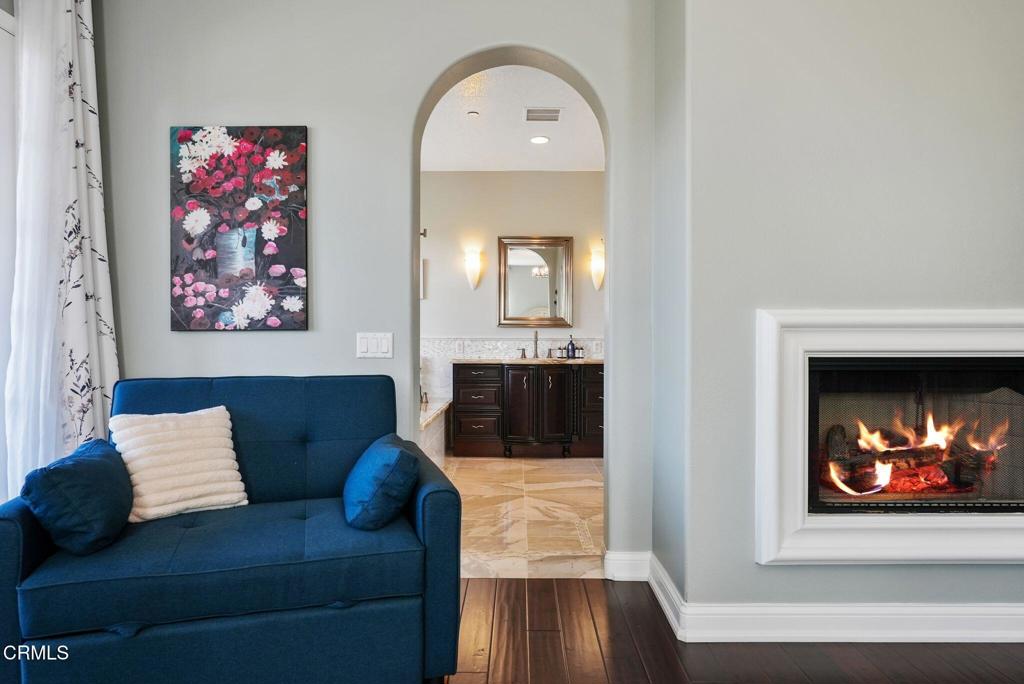 1424 Donegal Way Oxnard, CA 93035 - Photo 42 of 64 a living room with furniture and a fireplace