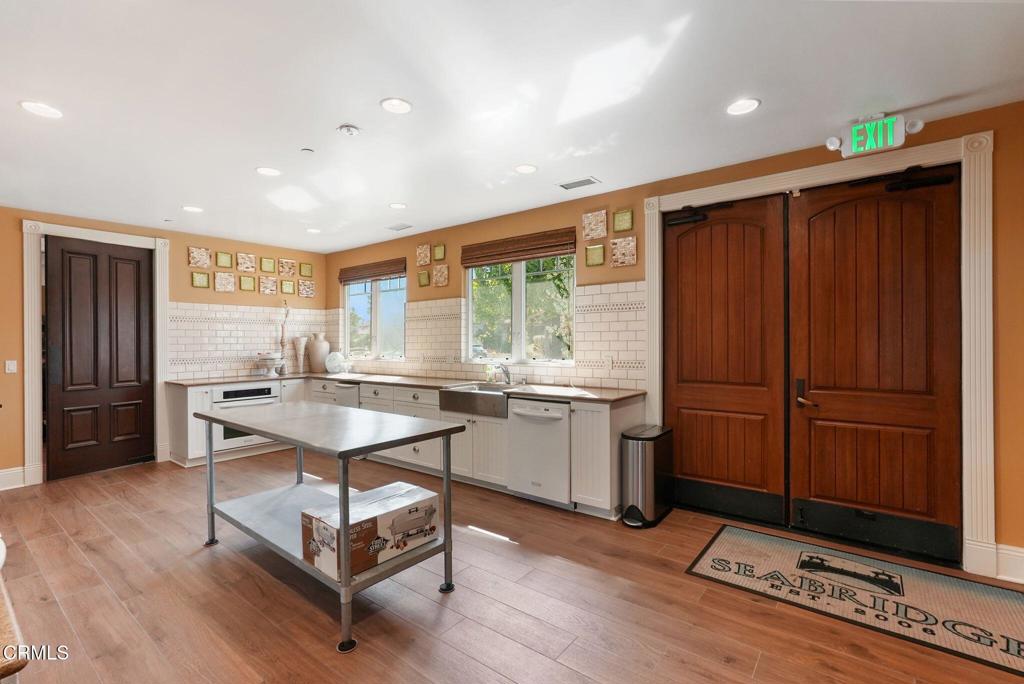 1424 Donegal Way Oxnard, CA 93035 - Photo 52 of 64 a room with furniture a window and wooden floors