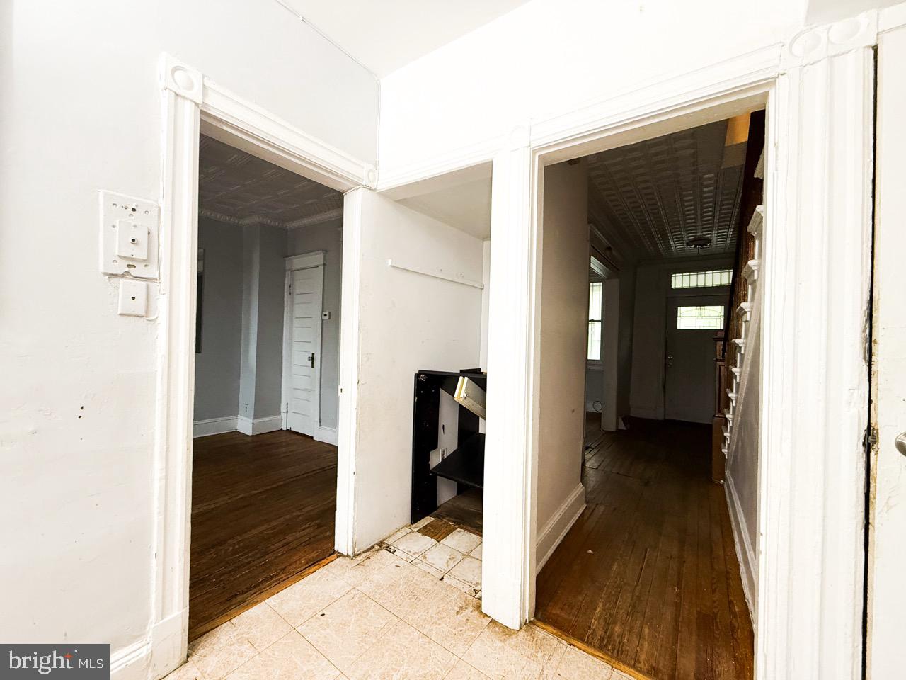 711 Florida Avenue Northeast Washington, DC 20002 - Photo 13 of 46 a view of hallway with closet and wooden floor