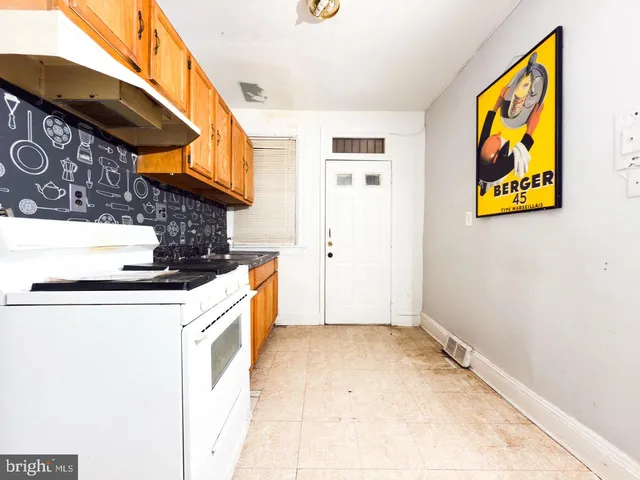 a utility room with washer and dryer