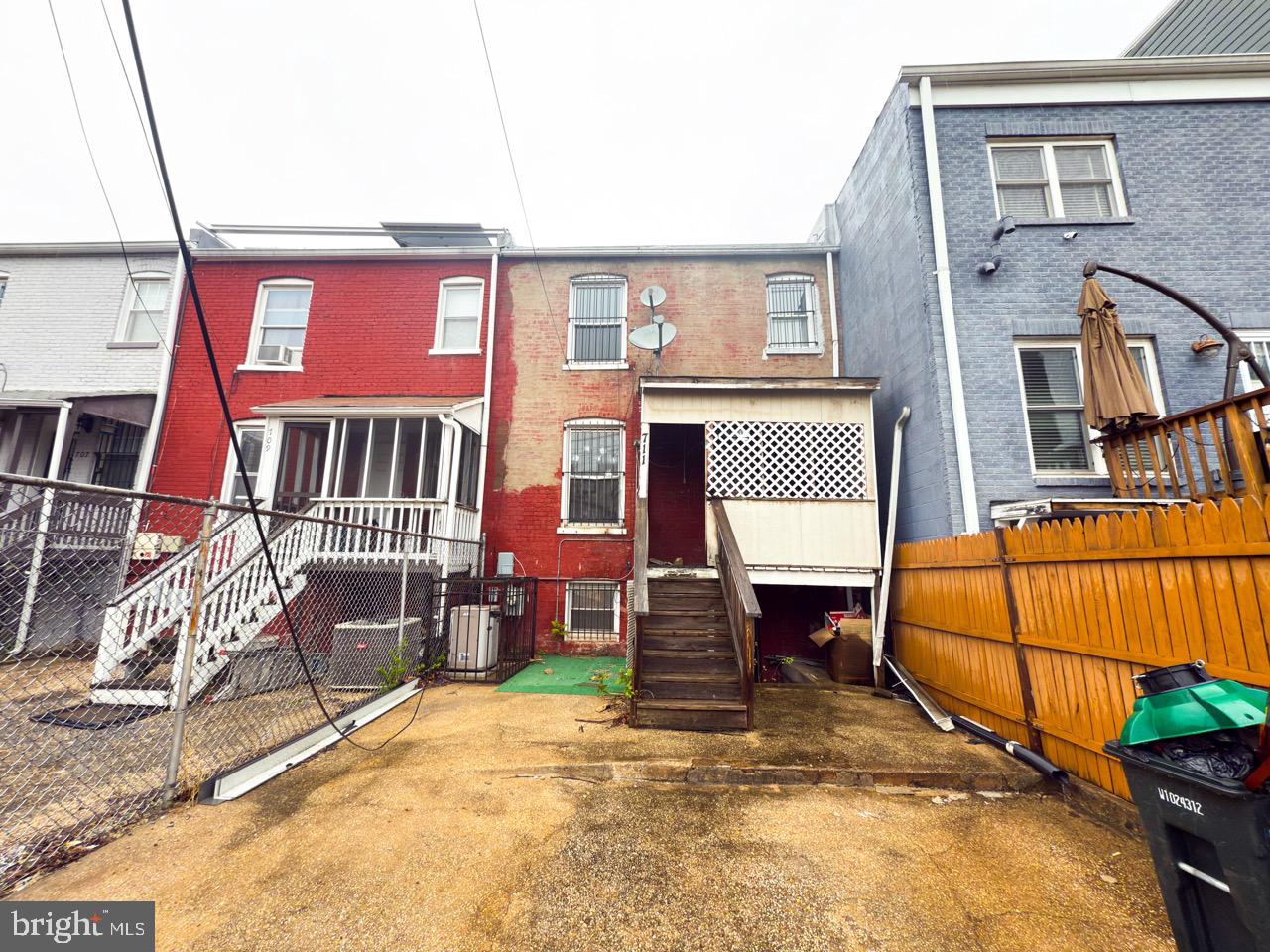 711 Florida Avenue Northeast Washington, DC 20002 - Photo 43 of 46 a backyard of a house with barbeque oven