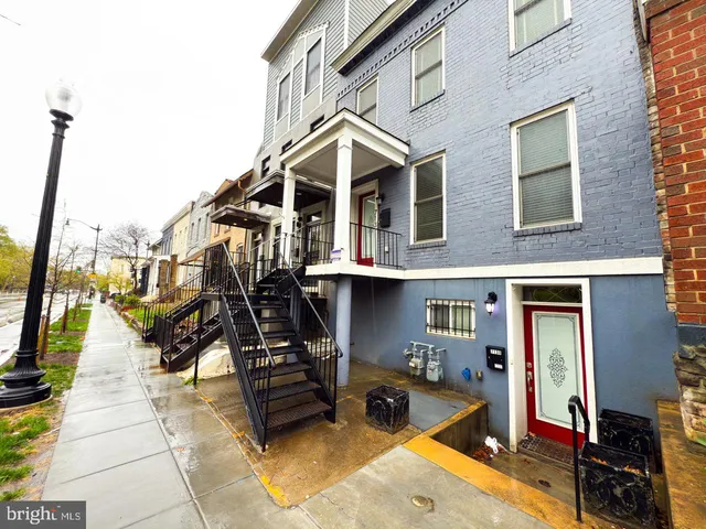 a view of swimming pool with chairs