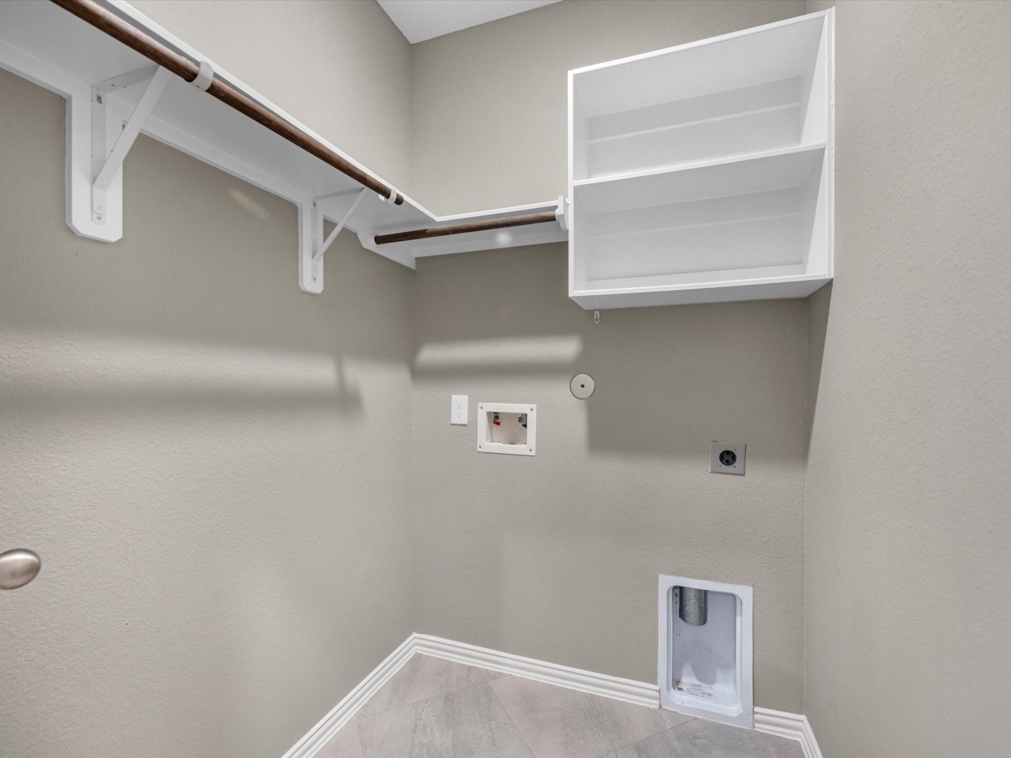 31120 Aspen Gate Trail Spring, TX 77386 - Photo 28 of 33 a view of a room with racks on the wall