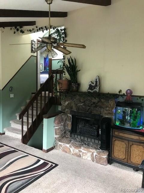 945 Wisp Creek Drive Bailey, CO 80421 - Photo 19 of 26 a vase of flowers sitting on a table