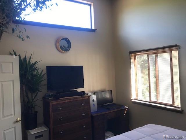 945 Wisp Creek Drive Bailey, CO 80421 - Photo 21 of 26 a view of a workspace with a window