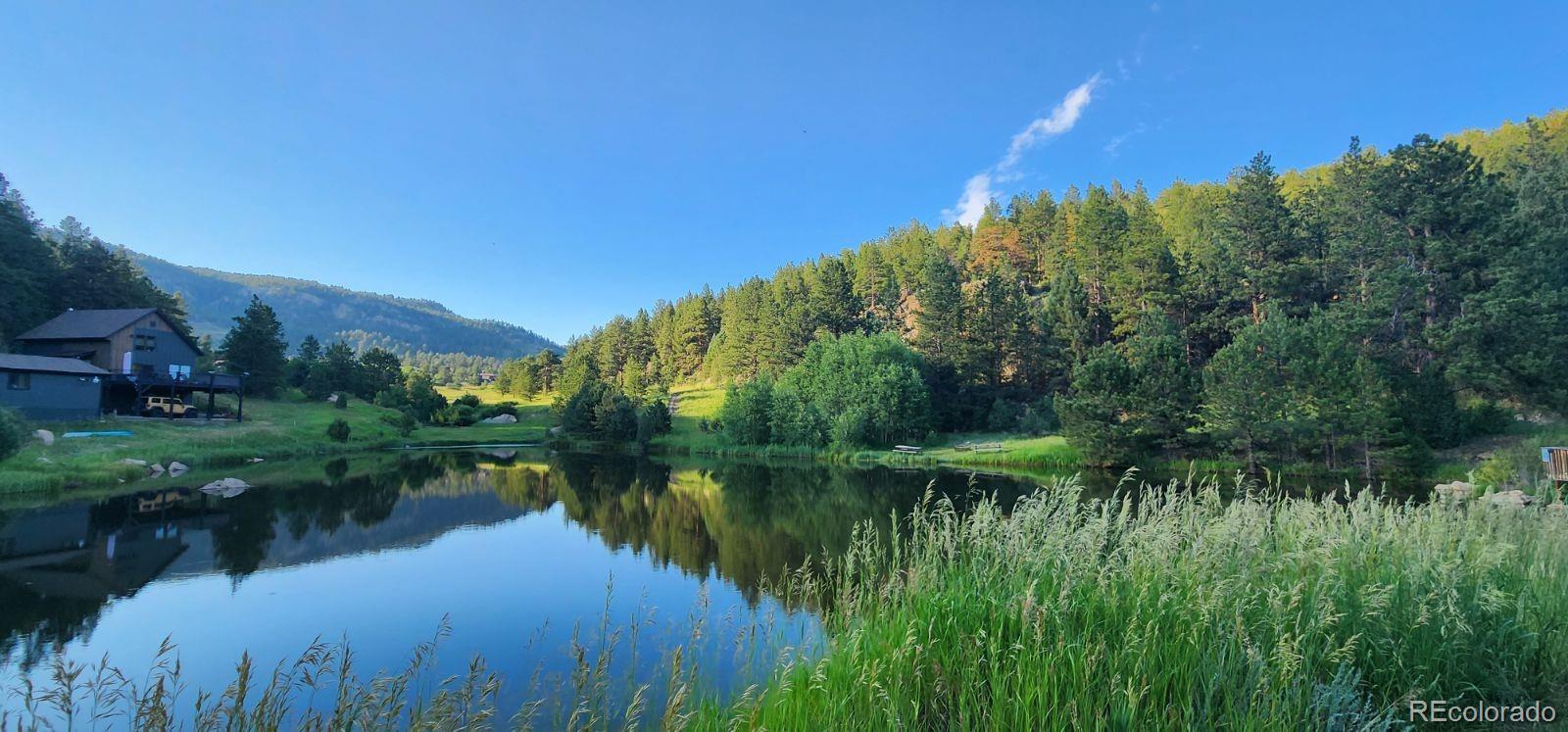 945 Wisp Creek Drive Bailey, CO 80421 - Photo 6 of 26 a view of lake