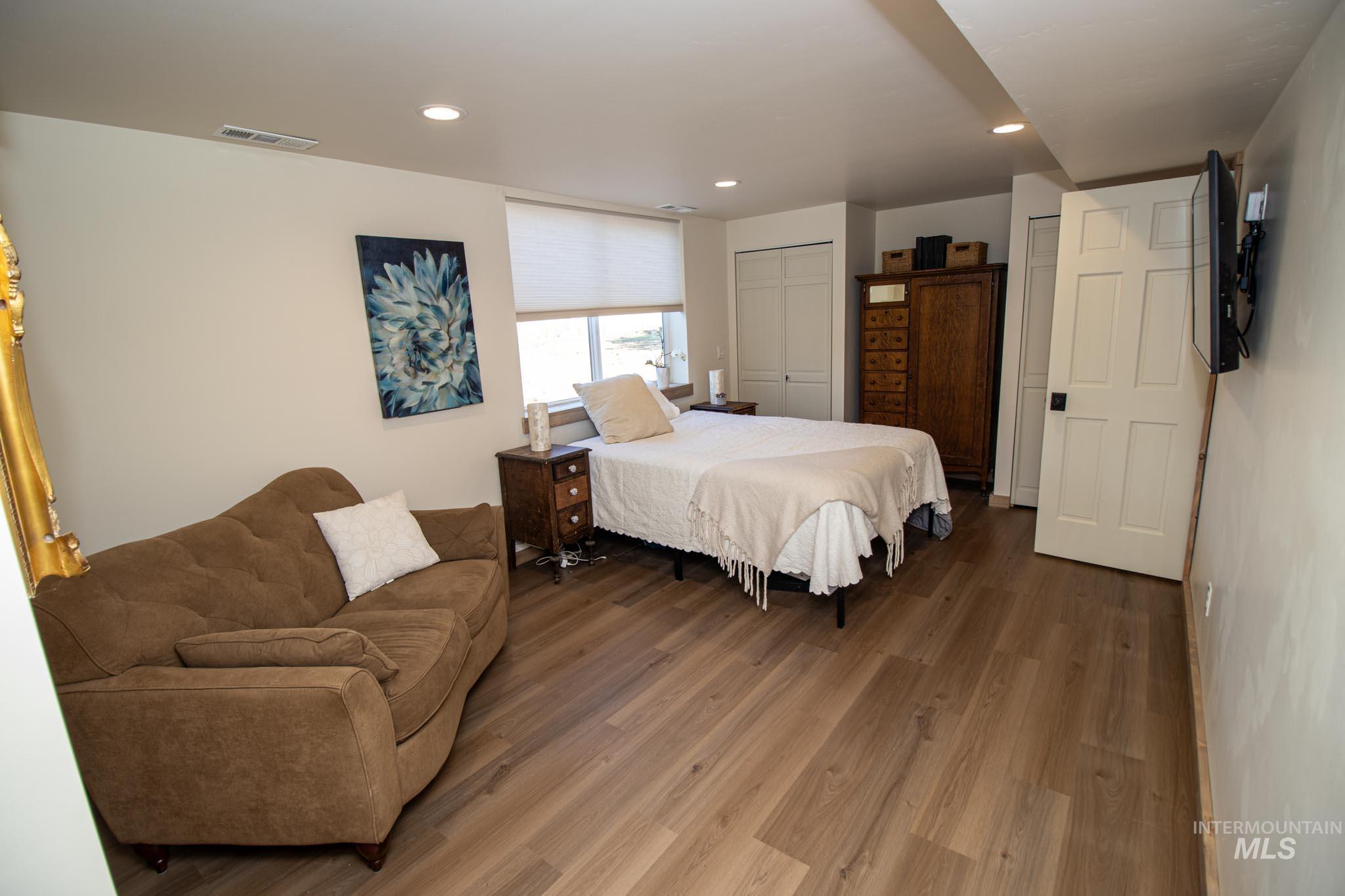 263 Glory Lane Orofino, ID 83544 - Photo 23 of 48 Bedroom with wood finished floors, recessed lighting, and a closet