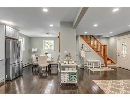 55 Cottage Road Boston, MA 02132 - Photo 11 of 30 a living room with lots of furniture and wooden floor