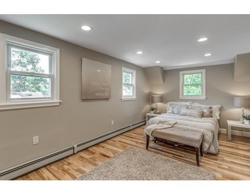 55 Cottage Road Boston, MA 02132 - Photo 13 of 30 a living room with furniture and a window
