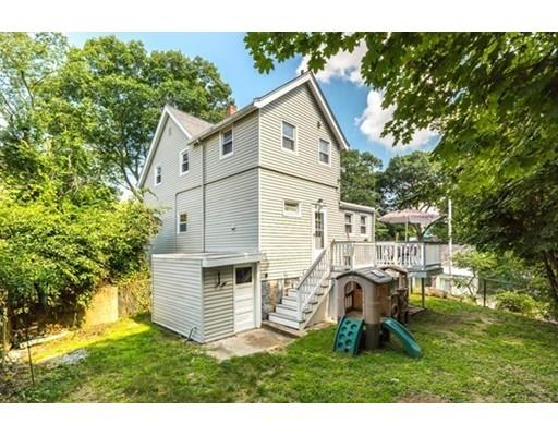 55 Cottage Road Boston, MA 02132 - Photo 22 of 30 a view of a back yard of the house