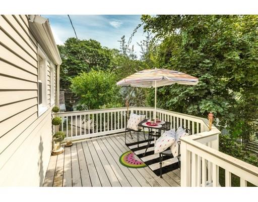 55 Cottage Road Boston, MA 02132 - Photo 23 of 30 a view of balcony with wooden floor and outdoor seating