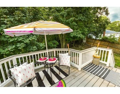 55 Cottage Road Boston, MA 02132 - Photo 24 of 30 a view of balcony with wooden floor and outdoor seating