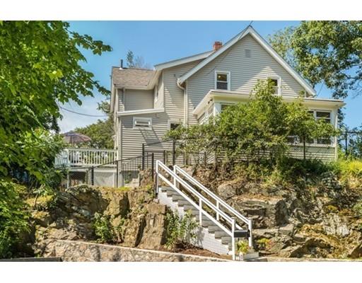 55 Cottage Road Boston, MA 02132 - Photo 26 of 30 a aerial view of a house with a yard and potted plants