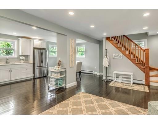 55 Cottage Road Boston, MA 02132 - Photo 4 of 30 a view of a living room and dining room