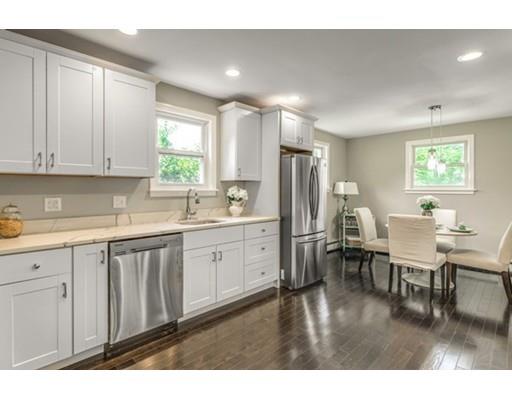 55 Cottage Road Boston, MA 02132 - Photo 7 of 30 a kitchen with refrigerator and window