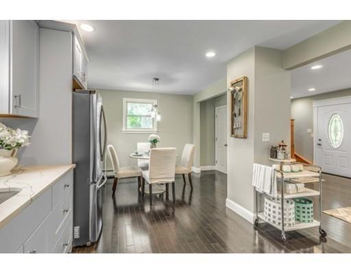 55 Cottage Road Boston, MA 02132 - Photo 8 of 30 a view of a dining room with furniture and wooden floor