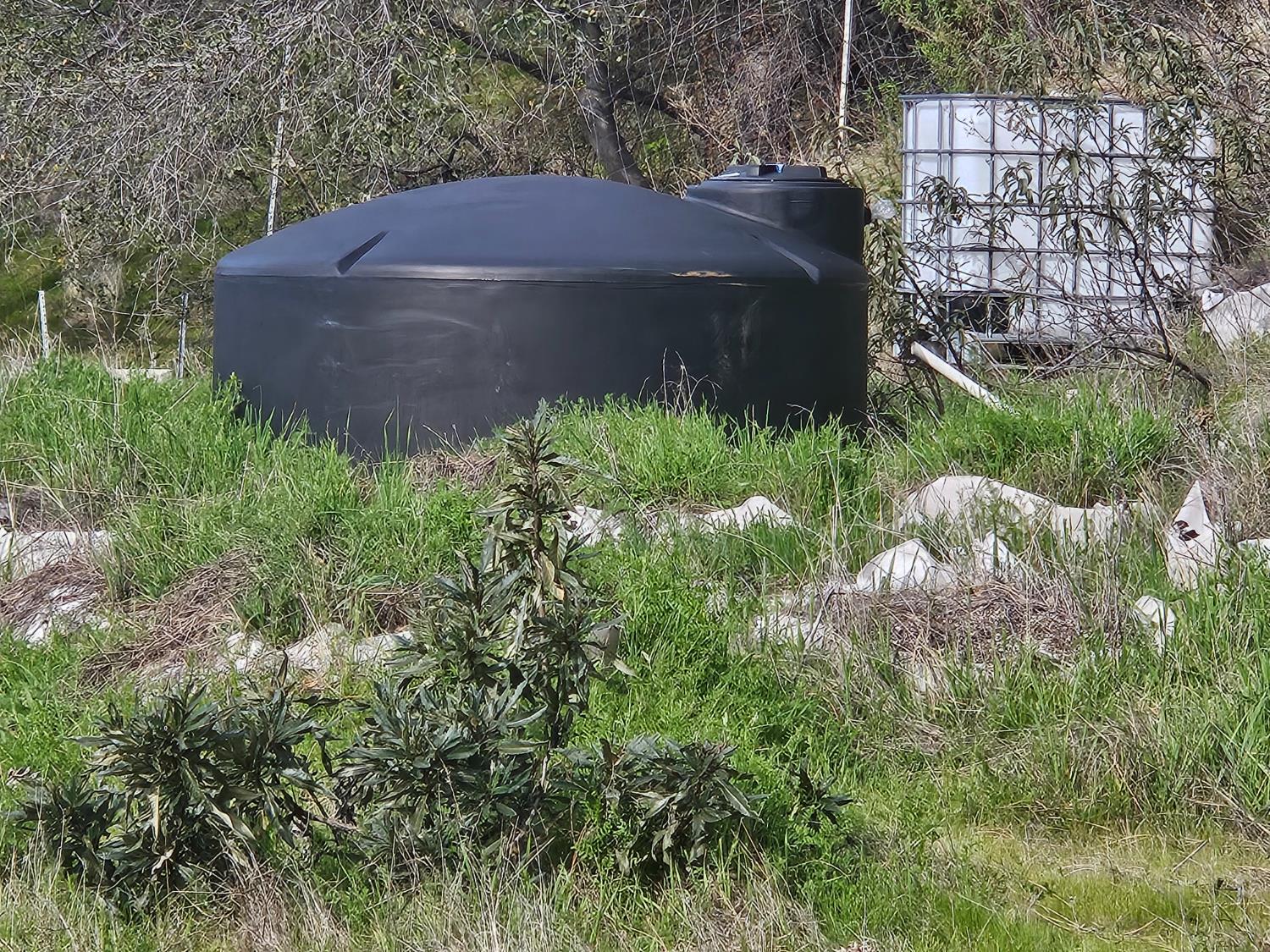 4394 Appaloosa Road Angels Camp, CA 95222 - Photo 24 of 30 Holding tank at the top of the property. Water from lower property pumps up to the holding tank.