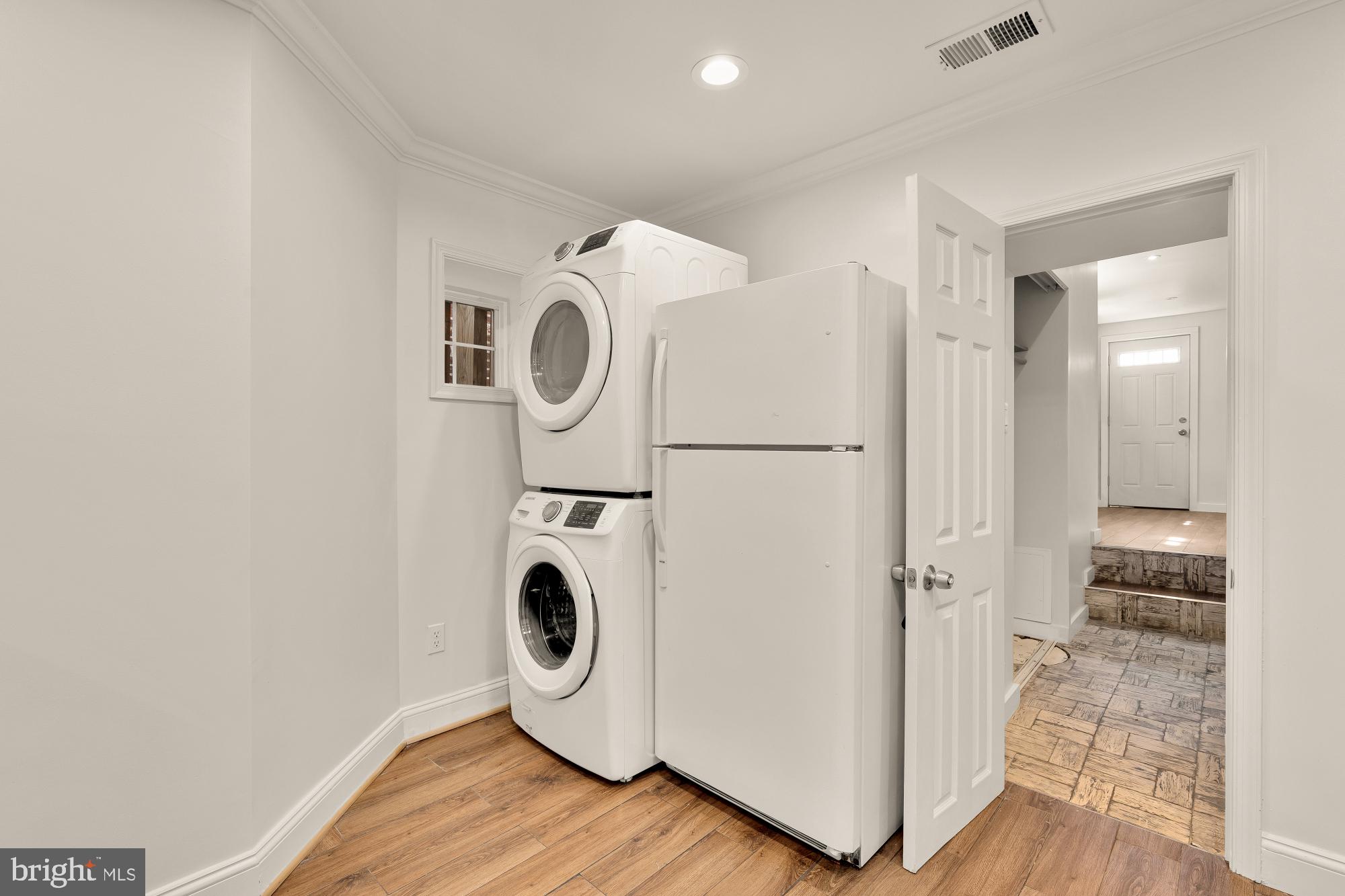 1732 North Capitol Street Northwest Washington, DC 20002 - Photo 12 of 47 a utility room with dryer and washer
