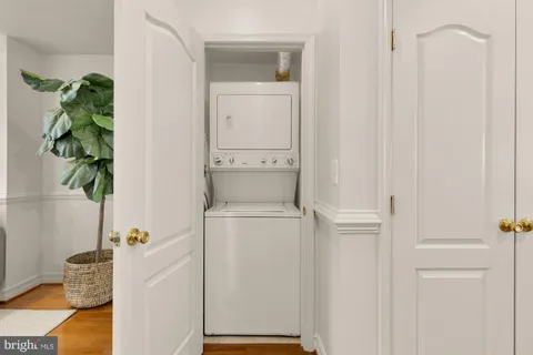 a bedroom with a large bed and a dresser