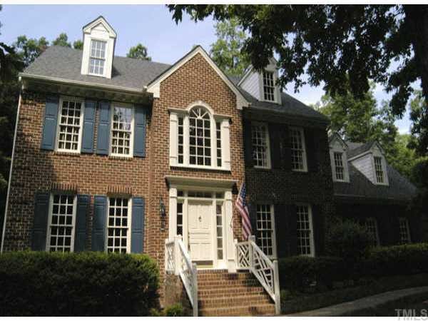 7609 Rainwater Road Raleigh, NC 27615 - Photo 1 of 1 a front view of a house with many windows