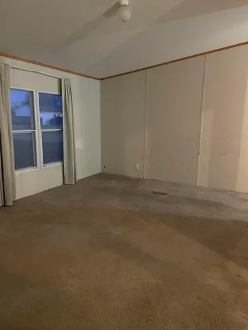 a kitchen with stainless steel appliances a stove a sink and a refrigerator