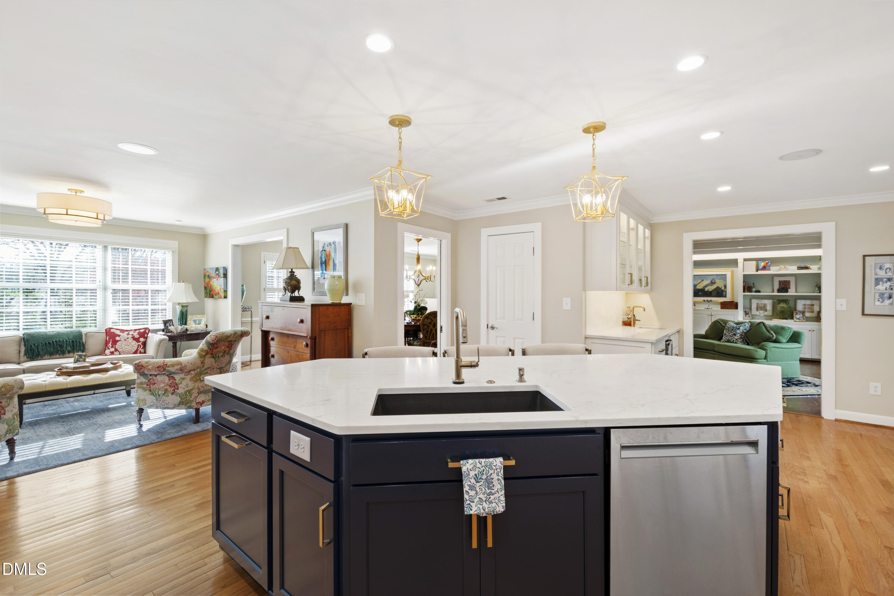 1304 Diehl Street Raleigh, NC 27608 - Photo 11 of 60 a kitchen with a sink appliances and cabinets