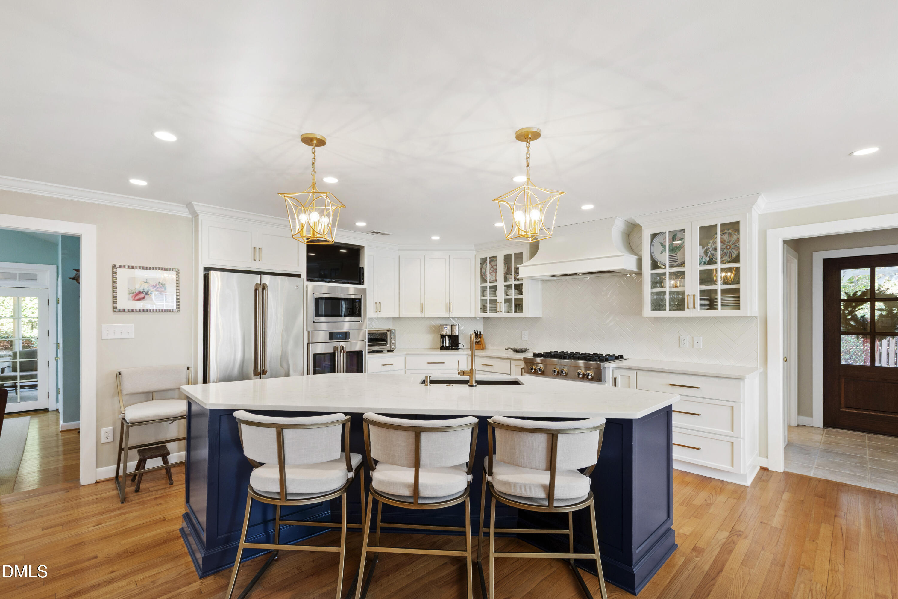 1304 Diehl Street Raleigh, NC 27608 - Photo 12 of 60 a dining room with furniture and wooden floor
