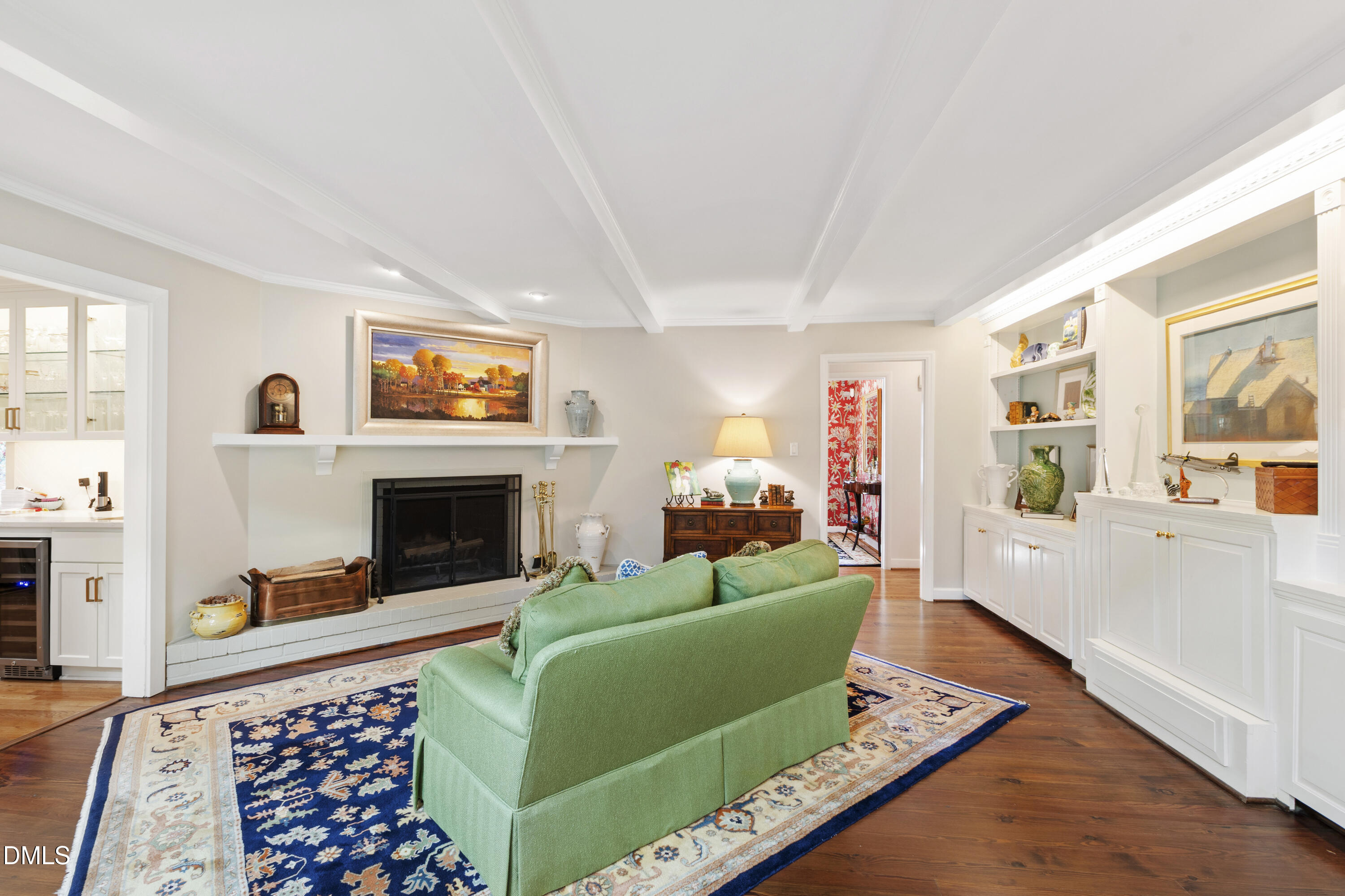 1304 Diehl Street Raleigh, NC 27608 - Photo 20 of 60 a living room with furniture and a fireplace