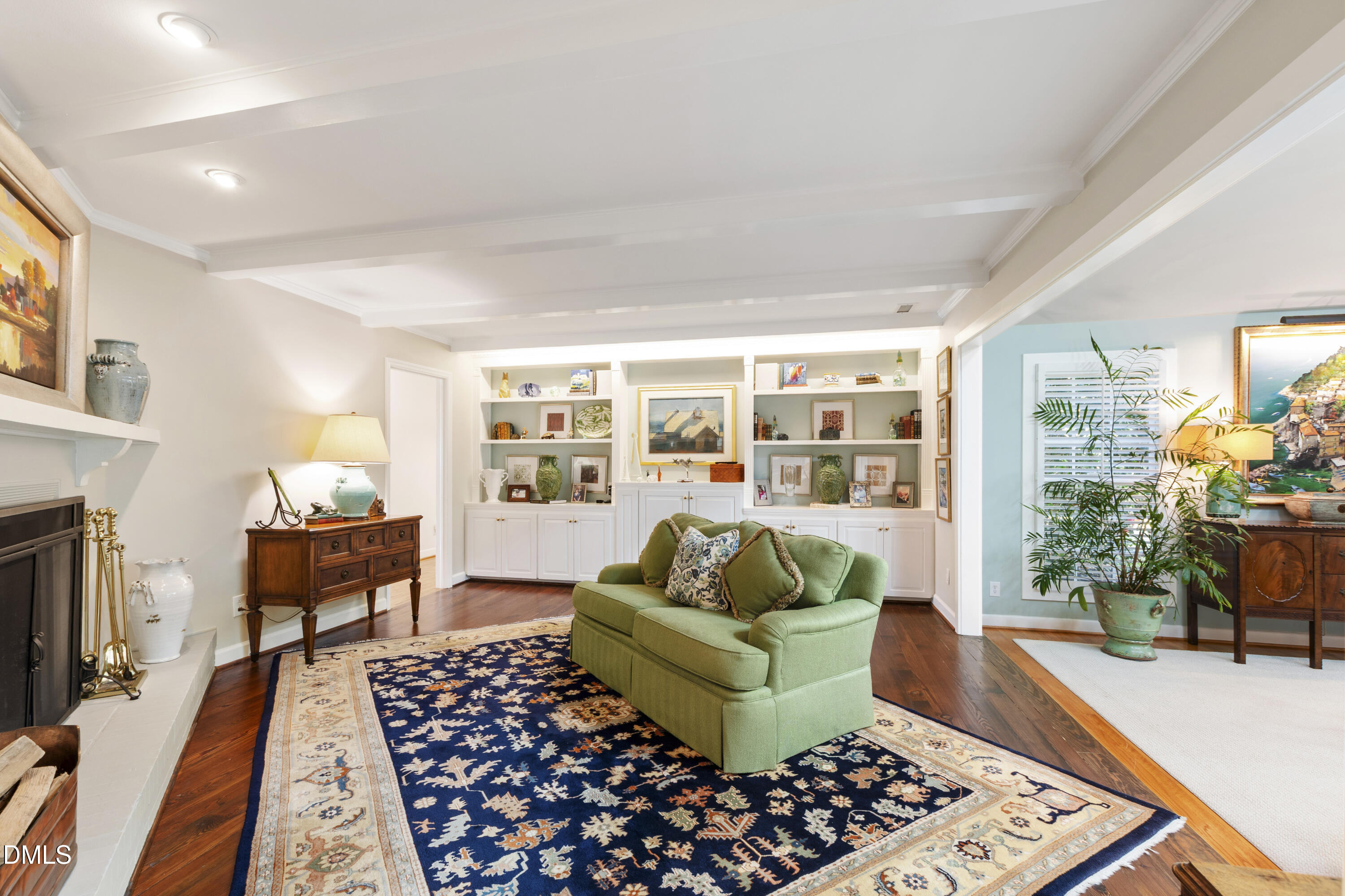 1304 Diehl Street Raleigh, NC 27608 - Photo 22 of 60 a living room with furniture and a rug