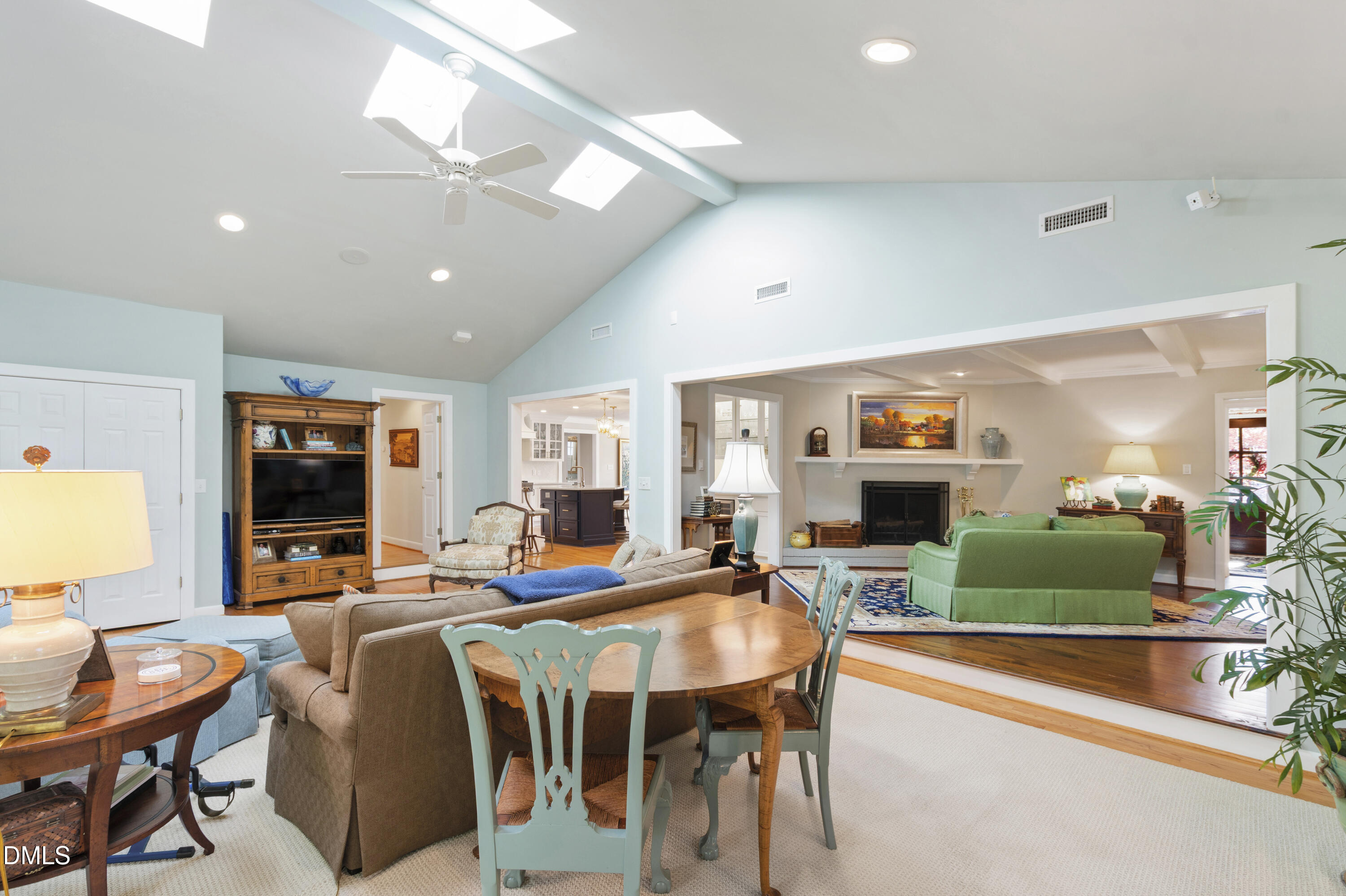 1304 Diehl Street Raleigh, NC 27608 - Photo 24 of 60 a living room with furniture and a flat screen tv