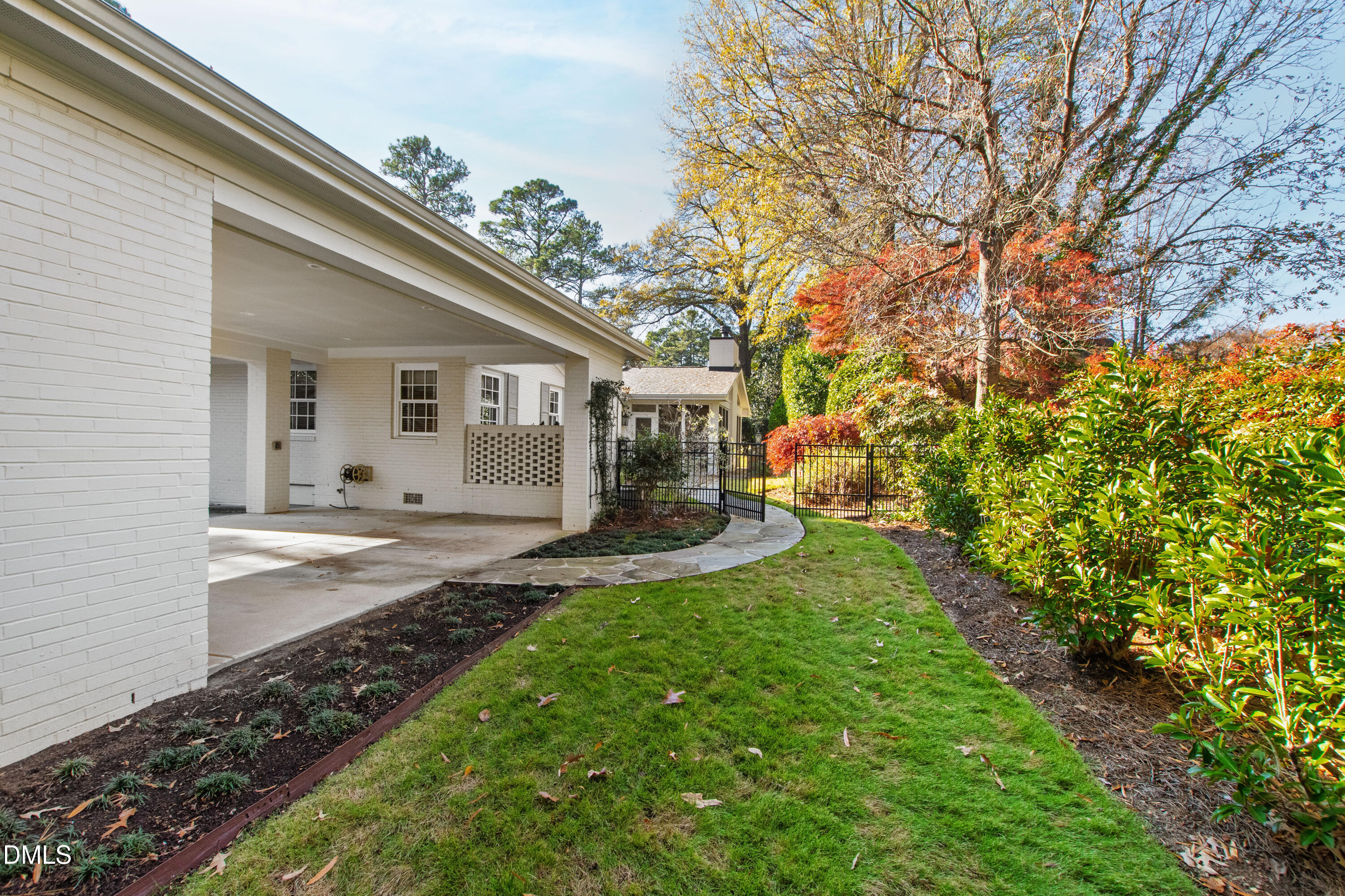 1304 Diehl Street Raleigh, NC 27608 - Photo 55 of 60 a view of a house with a yard
