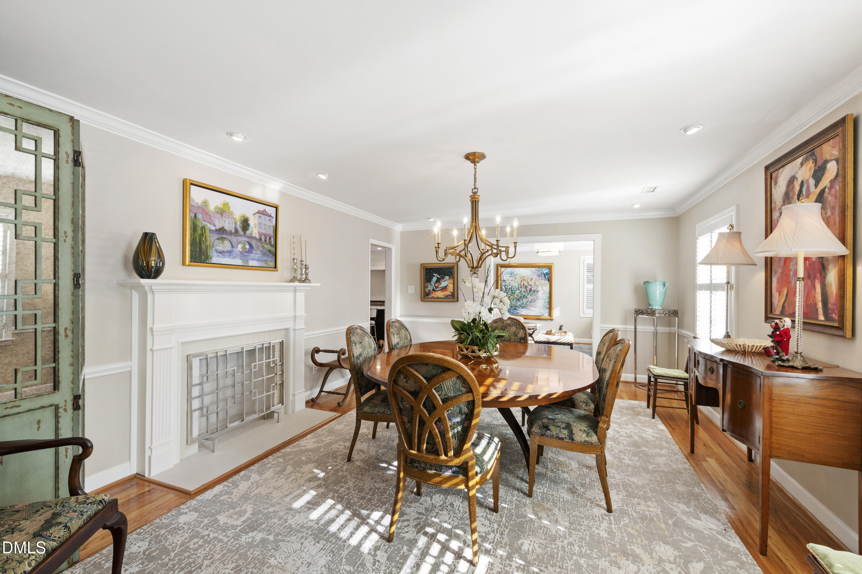 1304 Diehl Street Raleigh, NC 27608 - Photo 6 of 60 a view of a dining room with furniture window and wooden floor