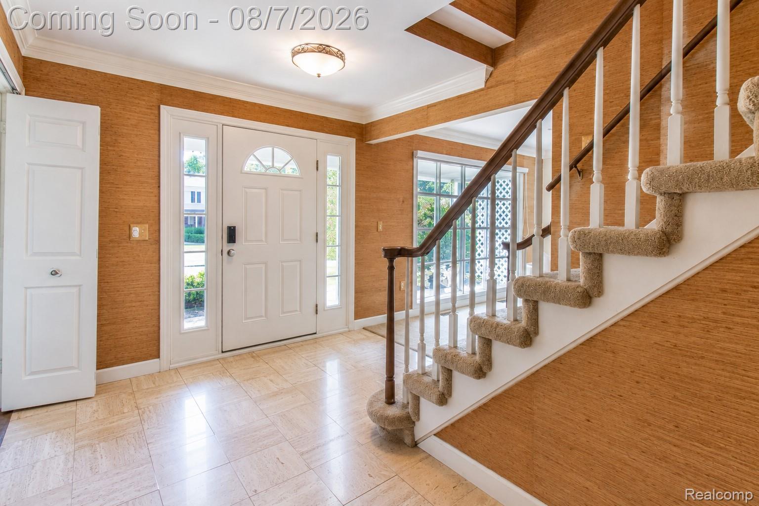 3149 Tamarron Drive Rochester, MI 48309 - Photo 6 of 48 Entry foyer featuring natural fiber wall coverings and marble flooring