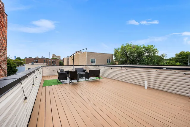 a view of a terrace with chairs