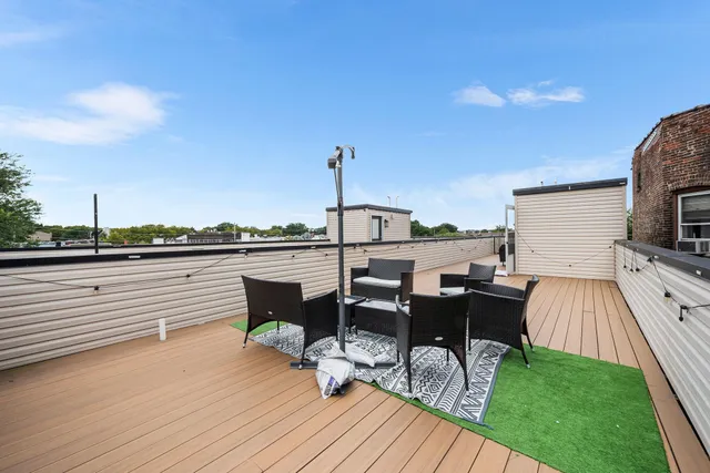 a view of a terrace with seating space