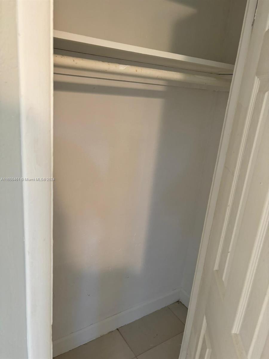 204 Southwest 2nd Place, Unit 2 Dania Beach, FL 33004 - Photo 13 of 13 a view of a closet