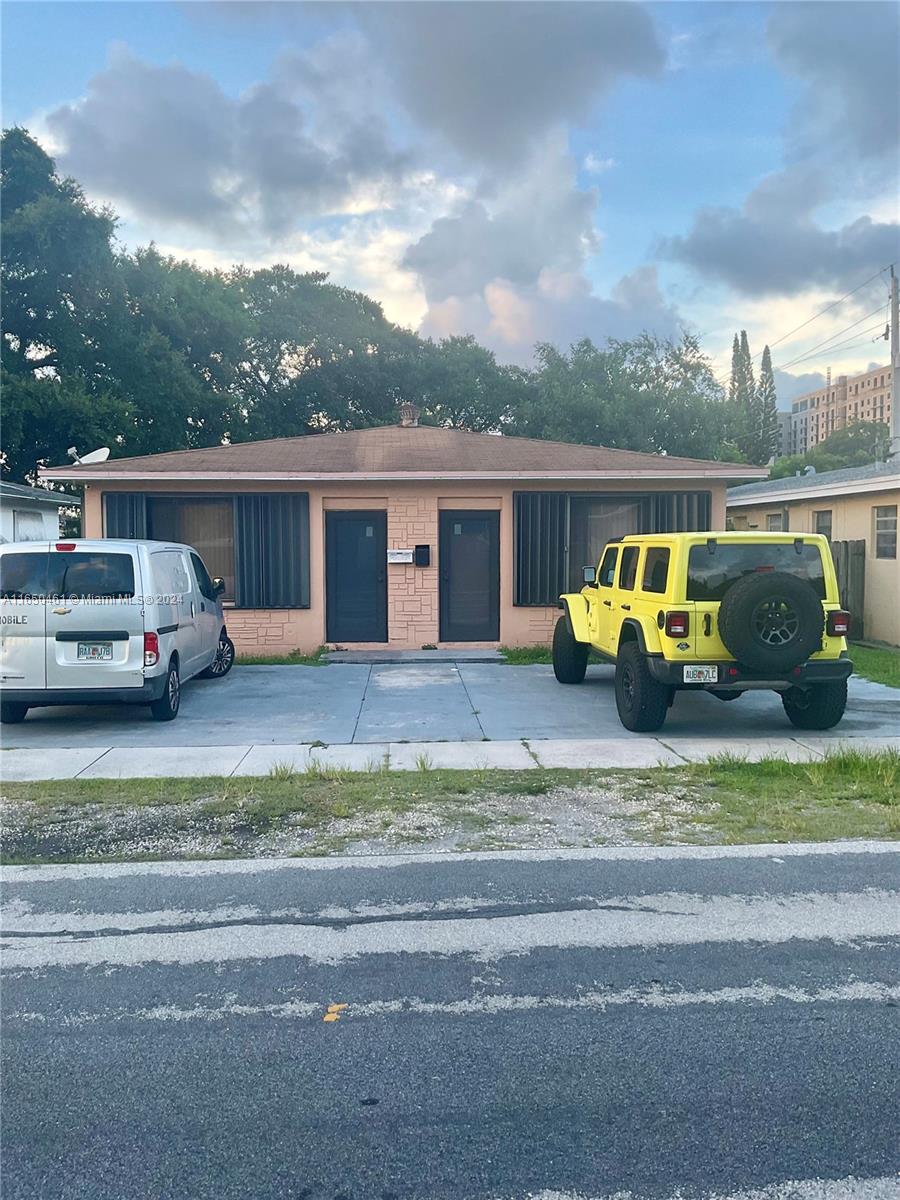 204 Southwest 2nd Place, Unit 2 Dania Beach, FL 33004 - Photo 2 of 13 a view of a house with a ocean view
