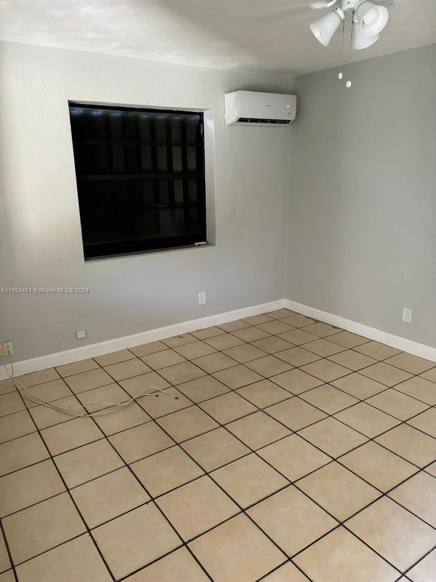204 Southwest 2nd Place, Unit 2 Dania Beach, FL 33004 - Photo 10 of 13 a view of an empty room