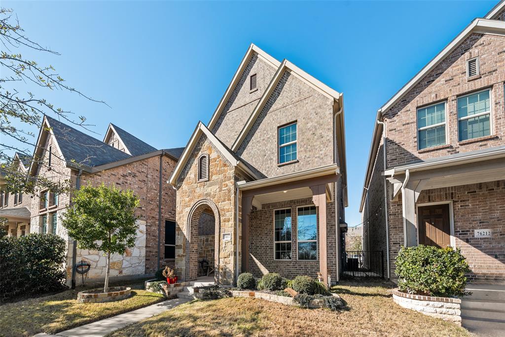 7617 Sunset Boulevard Rowlett, TX 75088 - Photo 2 of 21 View of front of home featuring brick siding, a front yard, and a porch