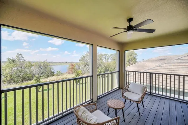 a view of a porch with furniture