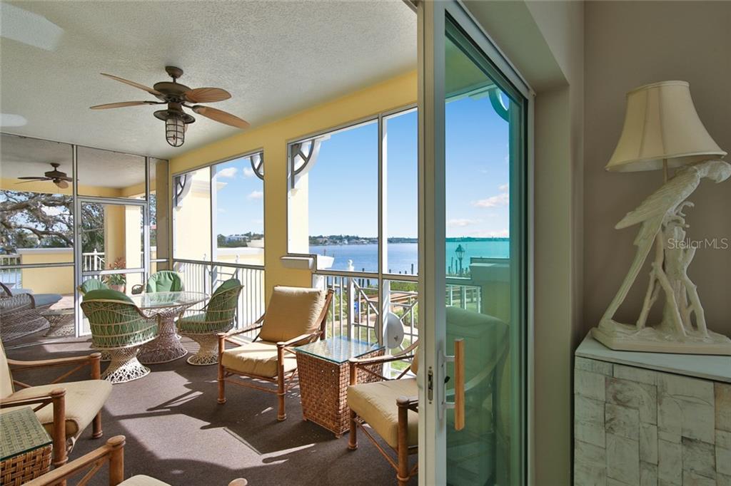 1310 Old Stickney Point Road, Unit E21 Sarasota, FL 34242 - Photo 14 of 25 Large screen balcony off Master Bedroom